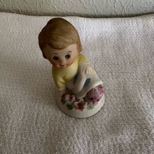 Cute Child Figurine with Yellow‎ and Pink Details